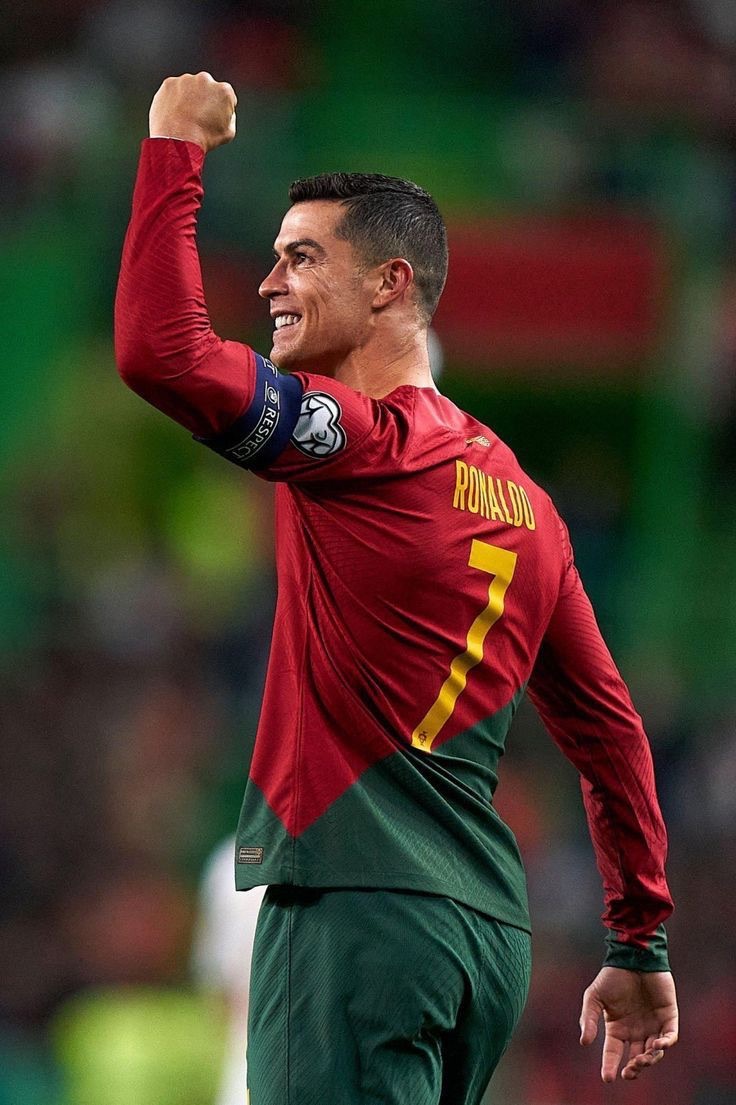 Cristiano Ronaldo celebrating in a red Portugal jersey